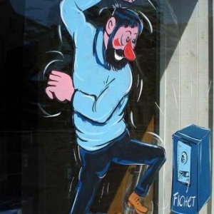 Mantes la jolie, peinture sur vitrine pour le festival de la bande dessinee par un artiste belge, Jean-Marie Lesage