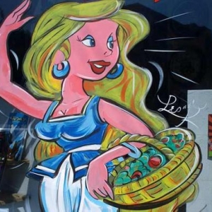 Mantes la jolie, peinture sur vitrine pour le festival de la bande dessinee par un artiste belge, Jean-Marie Lesage
