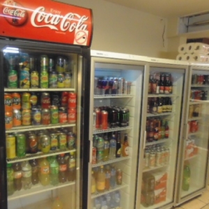 Night shop. Cans of beer and soft drinks.